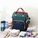 2-in-1 Luiertas met Uitklapbaar Babybed – Ideaal voor Onderweg & Reizen | TravelNest More For Mini