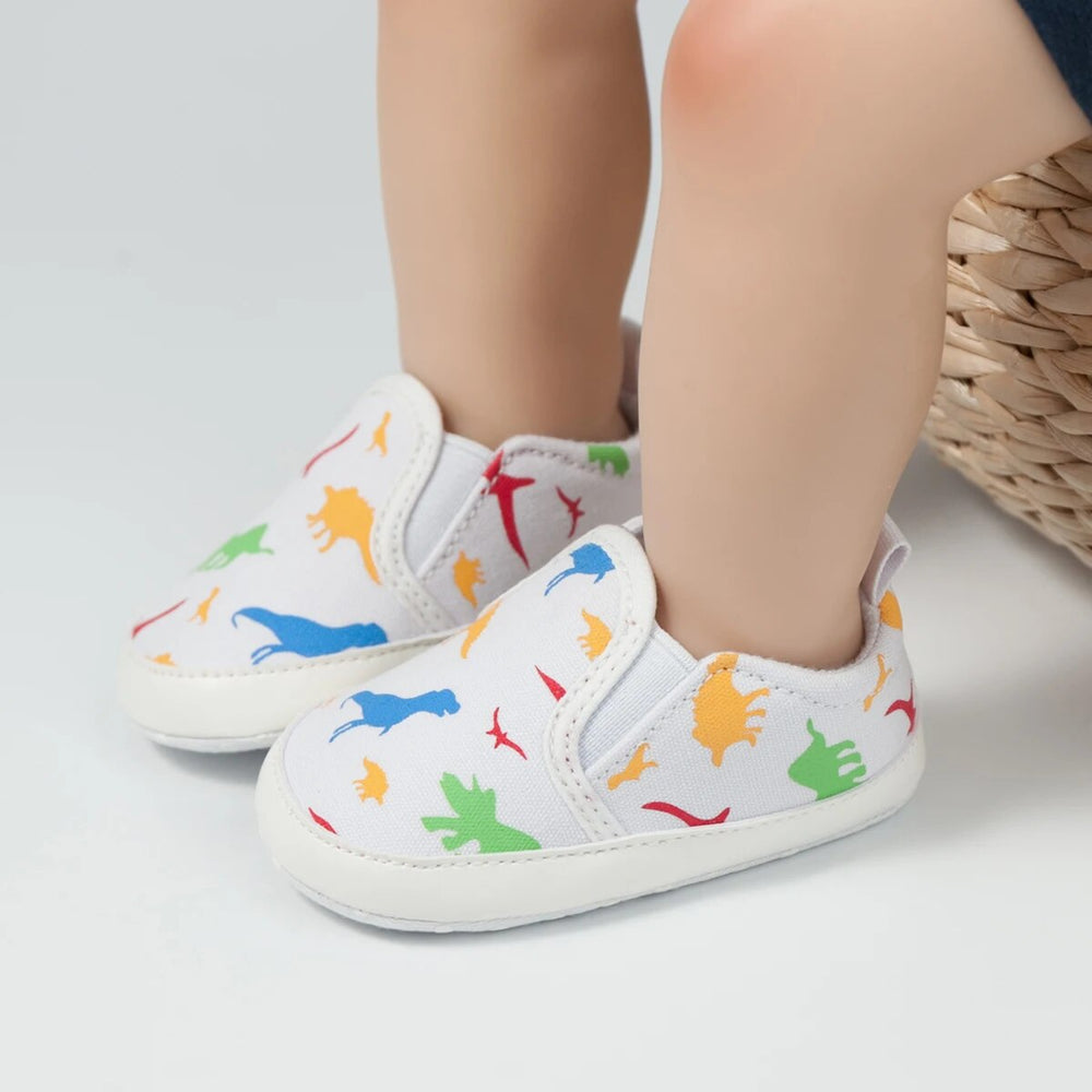 Slip-on-babyskor med halkfri sula – Minoe instegssneakers med dinosaurie och enhörning (0–18 månader) More For Mini