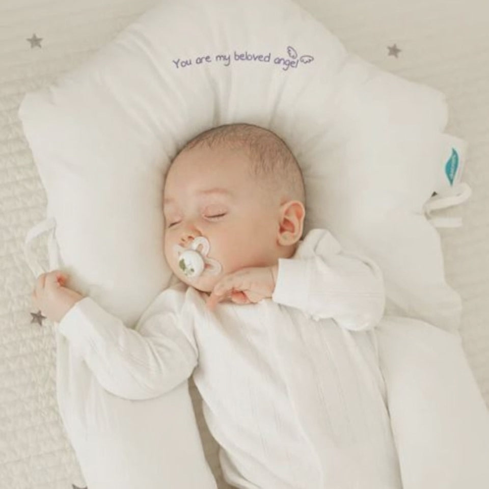 Ergonomisk babykudde i mjukt andningsbart material